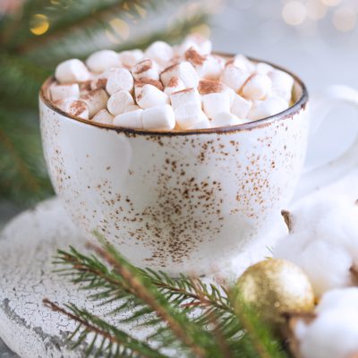 Mug of hot chocolate with candy marshmallows. Winter beverage.  Holiday concept, Selective focus